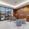 a lounge with a large glass wall