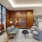 a room with a couch and chairs
